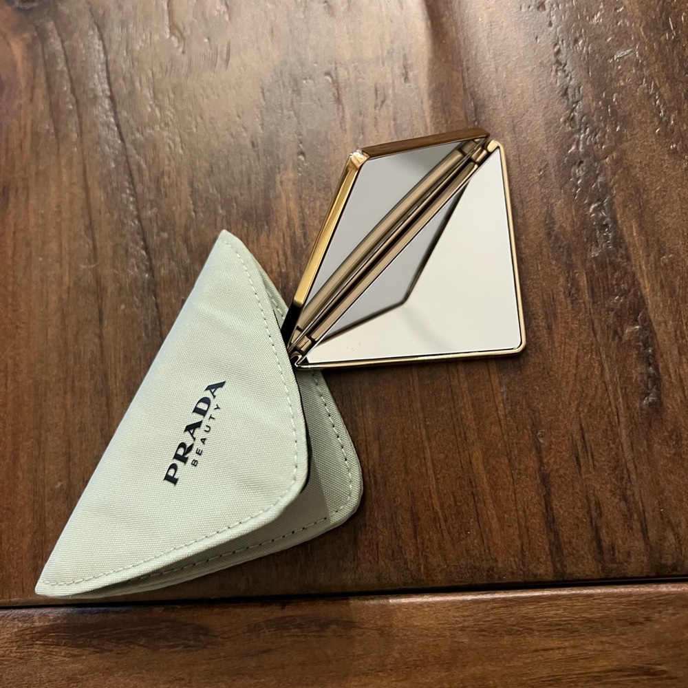 Prada mirror with light green case